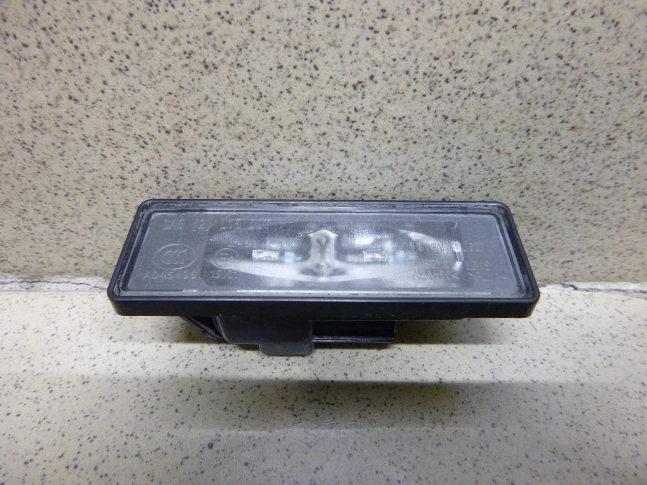 Фонарь подсветки номера