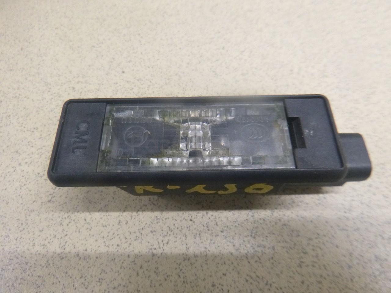 Фонарь подсветки номера