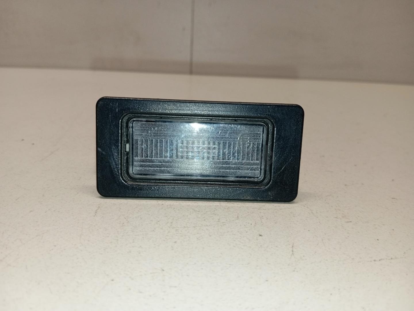 Фонарь подсветки номера