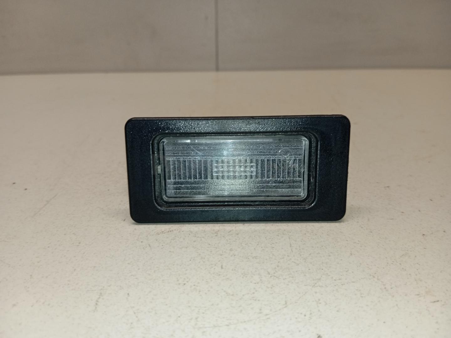 Фонарь подсветки номера